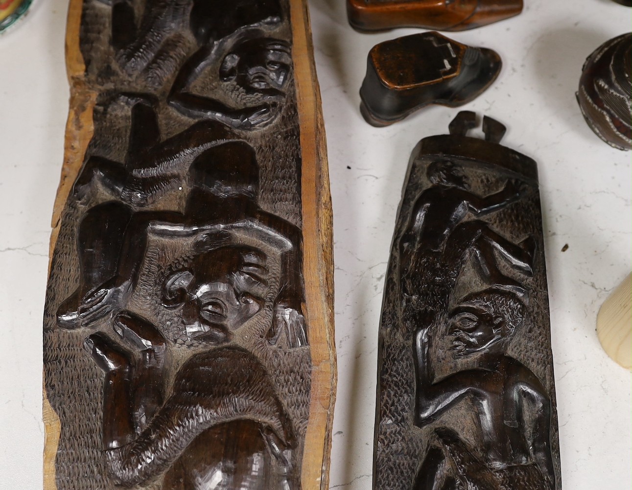 An interesting sectional wooden articulated crocodile, together with African wooden tribal carved totems, and other miscellaneous wooden items, tallest 53cm